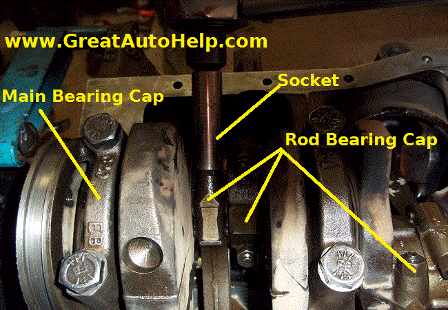 Removing pistons and connecting rods from Ford 5.0L Mustang.